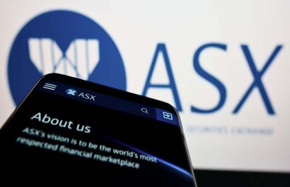 Stuttgart, Germany - 05-15-2022: Smartphone with website of Australian Securities Exchange Ltd (ASX) on screen in front of company logo. Focus on top-left of phone display. Unmodified photo.