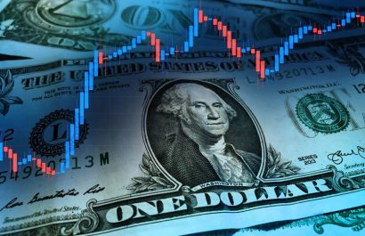 US dollar with a stock market index chart. Dollar rise concept. Economic recovery of the United States of America. US economic and financial recovery.