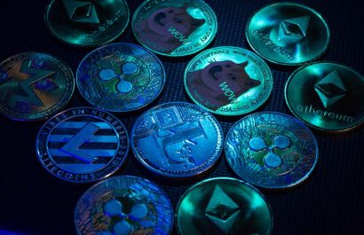 Altcoins over dark surface in neon light