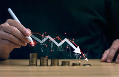 Economic collapse concept, businessman with falling financial graph chart due to global recession. Stock market crash, inflation, financial crisis, Falling income in GDP, capital reduction