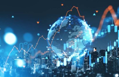 Earth sphere hologram with candlesticks and growing lines. Panoramic Bangkok cityscape at night. Concept of forex and investment, online trading and global market